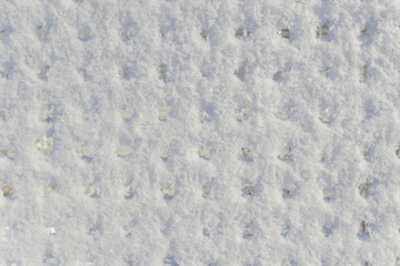 Background a non-uniform snow surface