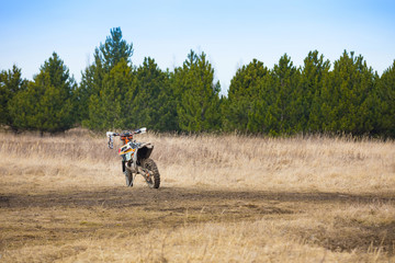 Motocross motorcycle on the off-road in nature next to small czech town Pribram, Czech republic © dtatiana