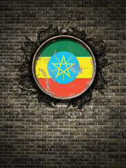 Old Ethiopia flag in brick wall