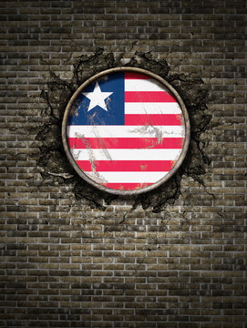 Old Liberia flag in brick wall