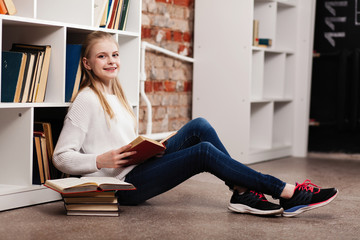 Teenage girl in a library