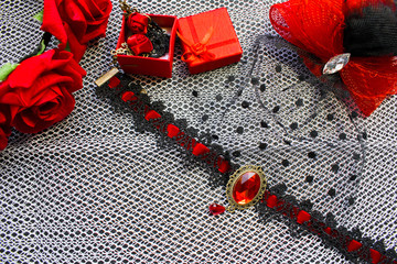 Black and red female accessories in a stylish vintage set
