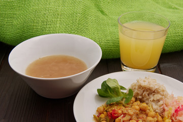 Cicer with vegetables and rice on a table