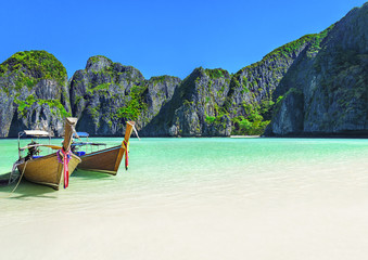 Maya Bay beach with two longtail boats, Ko Phi Phi Leh Island, Thailand