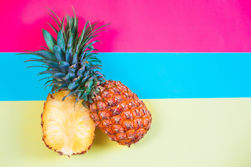 pineapple fruit on bright colored backgrounds