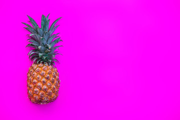 pineapple on bright pink background