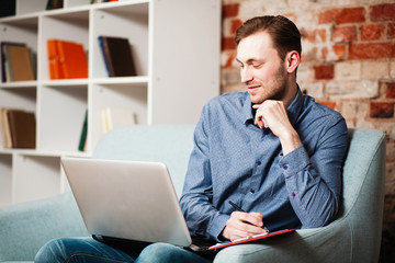 Young man with a laptop