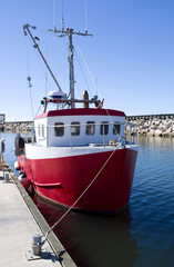 Laesoe / Denmark: Small fishing cutter moored at the head of a pier in Oesterby Havn on a sunny day in August © torstengrieger
