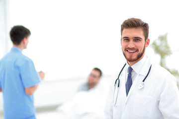 smiling doctor on blurred background