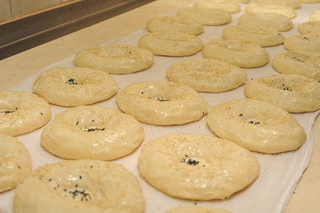 Process of cooking tandoor bread national Uzbek flatbread