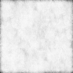 White grunge background. The texture of the old surface. Abstract pattern of cracks, scuffs, dust