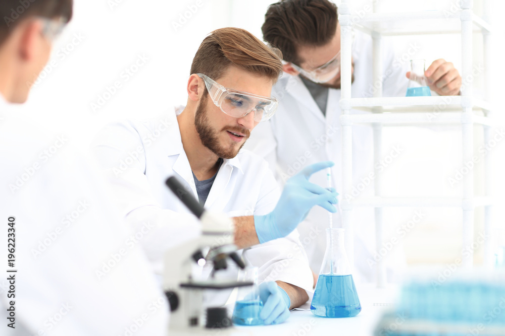 Wall mural background image science team in the lab