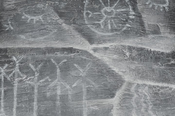 drawing on the wall of the cave painted by an ancient man. History. archeology