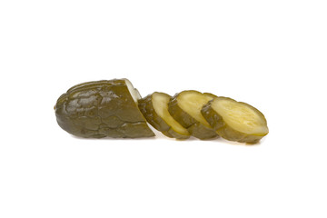 pickled cucumber cut into slices on a white background