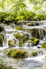 Fototapeta premium Beautiful waterfall in Plitvice Lakes National Park in summer in Croatia