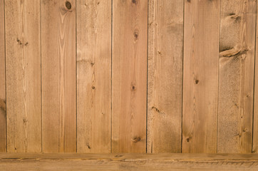 Walnut color wooden board surface background.