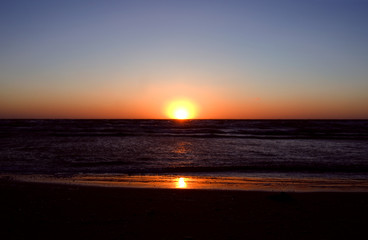 Laesoe / Denmark: Impressive sunset over the wide Kattegat Sea near Vesteroe Havn in April