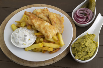 The fish and chips. A traditional English dish.