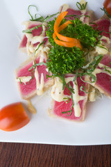 japanese cuisine. tuna sushi on the background