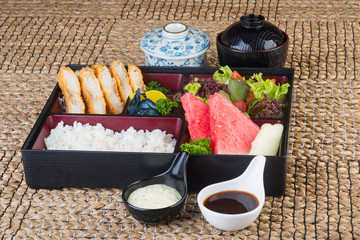 japanese cuisine. lunch box set on the background
