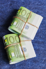 eurocurrency rolls on a blue background