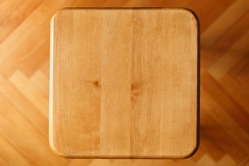 Top view of wooden stool, close