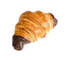 Gourmet french pastry rolled croissant with chocolate dipped edges. Glazed baked goods isolated on white background
