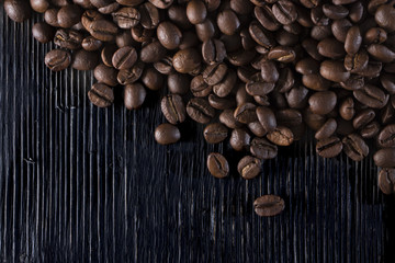 roasted coffee beans on wood texture
