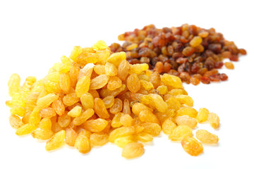 Various raisins on the white background. Dried grapes.