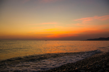 Amazing sea sunset, the sun, waves, clouds