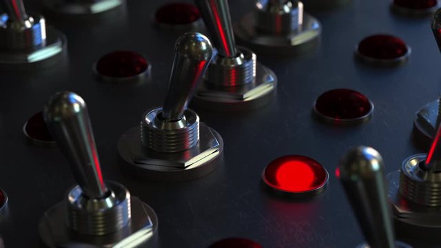 Switching toggle switch on a control panel, red light turns on