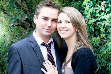 cheerful young couple in summer day posing