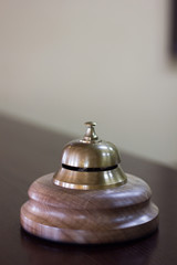 Service bell in a hotel reception for concierge alarm on desk.