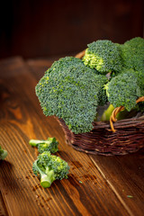 Beautiful green broccoli in a natural basket.