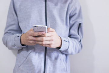 close-up of hands with mobile phone