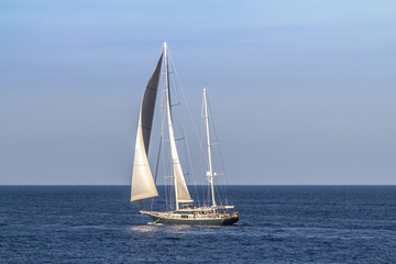 Sailboat sailing in the evening