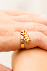 Beautiful gold ring on the finger