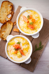Salmon soup. Two bowls of creamy salmon fish soup. Clean eating, healthy and diet food concept