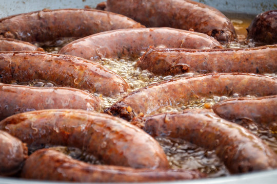 Sausages are baked in oil