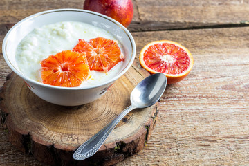 Milk rice porridge with blood orange
