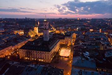 Fototapeta na wymiar panoramic view on sunset above old european city. bird's eye view.