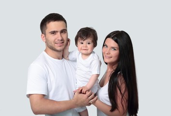 Fototapeta premium Happy family with newborn baby on a white background.