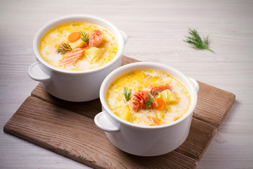 Salmon soup. Two bowls of creamy salmon fish soup. Clean eating, healthy and diet food concept