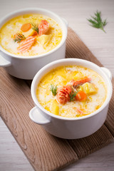 Salmon soup. Two bowls of creamy salmon fish soup. Clean eating, healthy and diet food concept