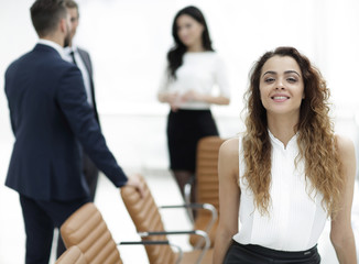 business woman on the background of business team