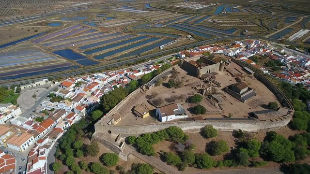 Aerial. The village of Castro Marim and the castle, filmed from sky drone.
