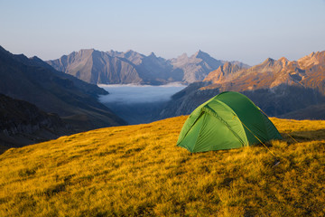 expedition in mountains with a tent
