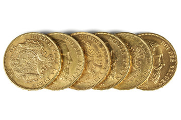 Belgian 20 Francs gold coins isolated on white background