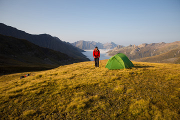 expedition in mountains with a tent
