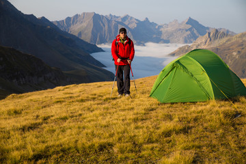 expedition in mountains with a tent

